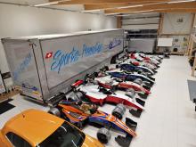Vue plongeante sur le parc automobiles de Sports-Promotion Sàrl